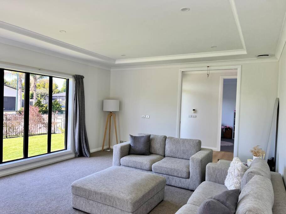 Sunny Delight In Clive Villa Luaran gambar
